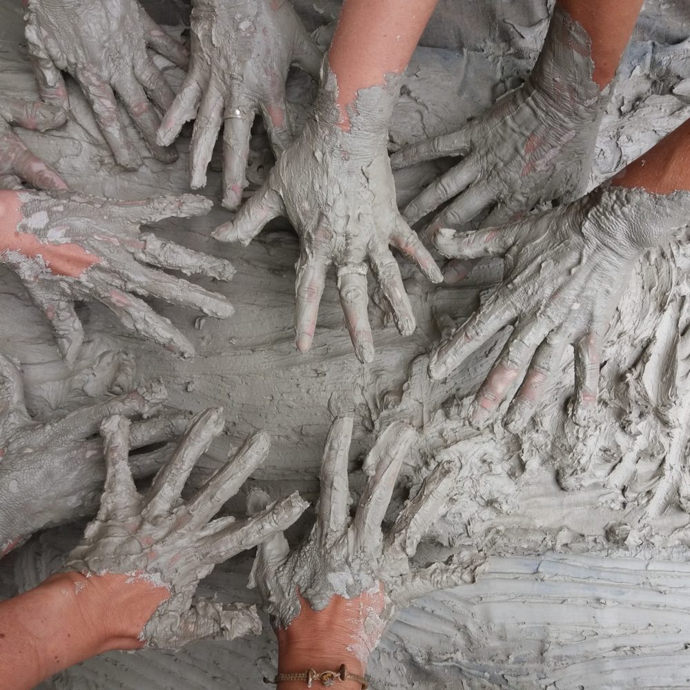 Hands in the mud