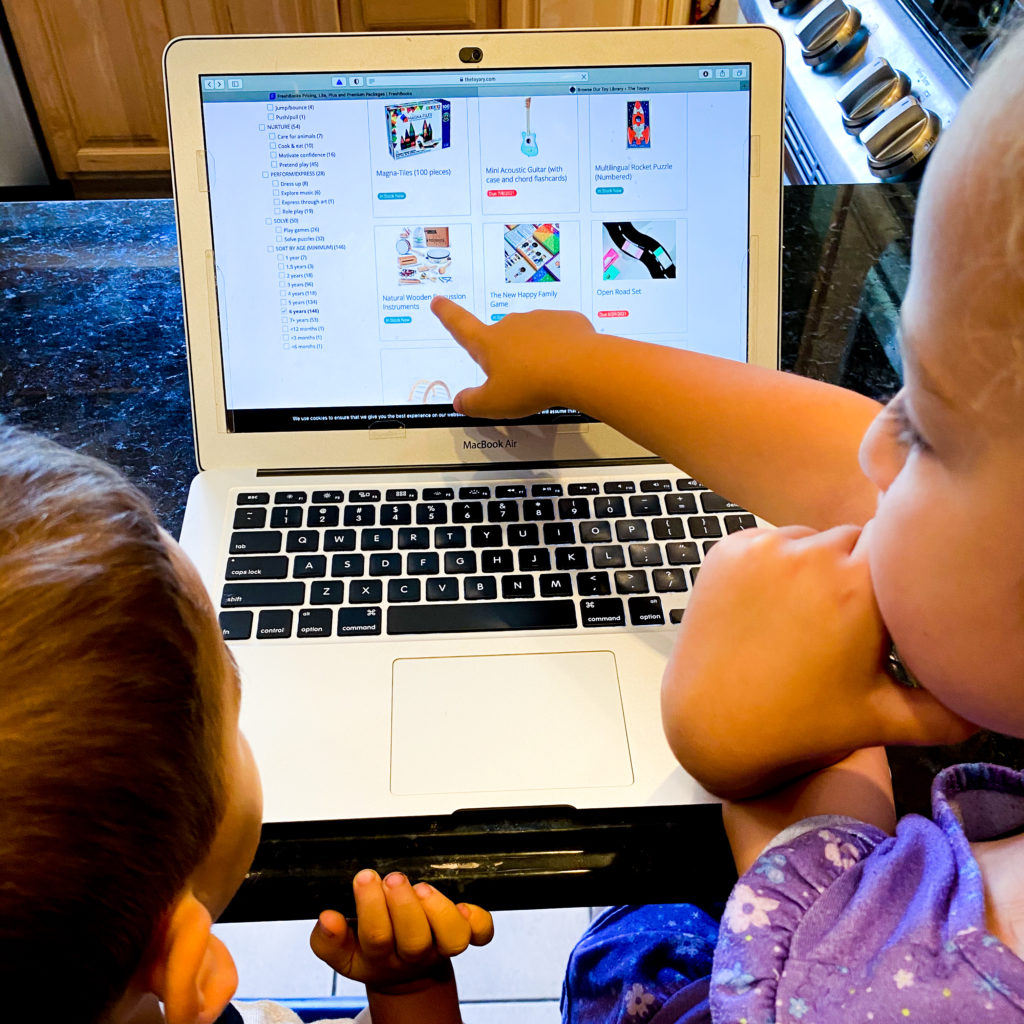 Children browsing the online toy library at thetoyary.com